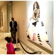 Two-year-old Parker Curry gazes at a portrait of former first lady Michelle Obama at the National Portrait Gallery in Washington, D.C.